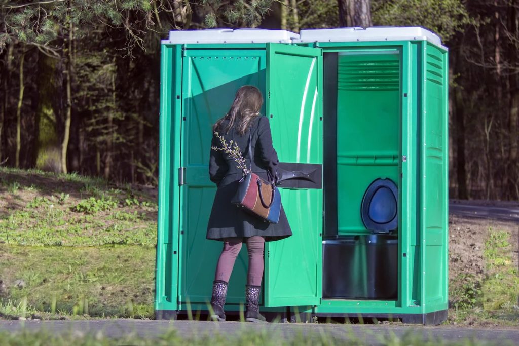 green portable toilet site